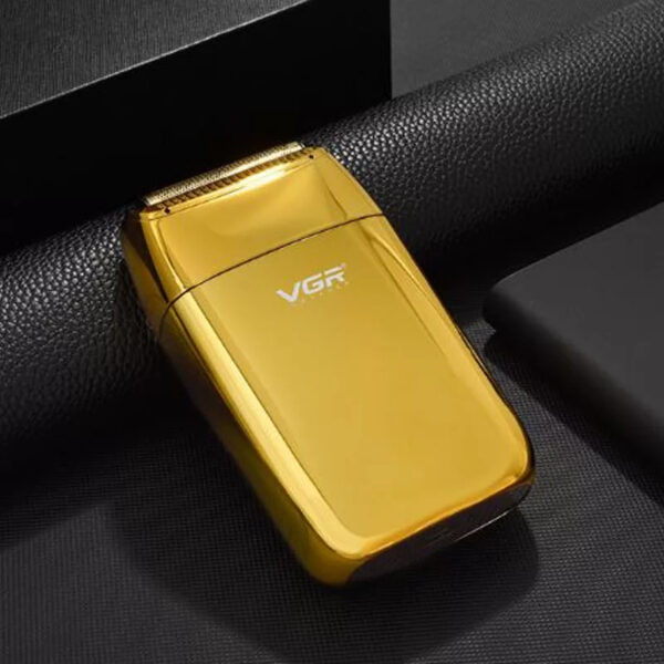 ماشین اصلاح موی صورت وی جی ار مدل V-399، استفاده به صورت خشک و مرطوب، منبع انرژی باتری ، تکنولوژی اصلاح به صورت فویلی، مدت زمان شارژ 180 دقیقه و مدت زمان استفاده پس از شارژ 200 دقیقه، به همراه برس تمیزکننده، جنس تیغه از تیتانیوم