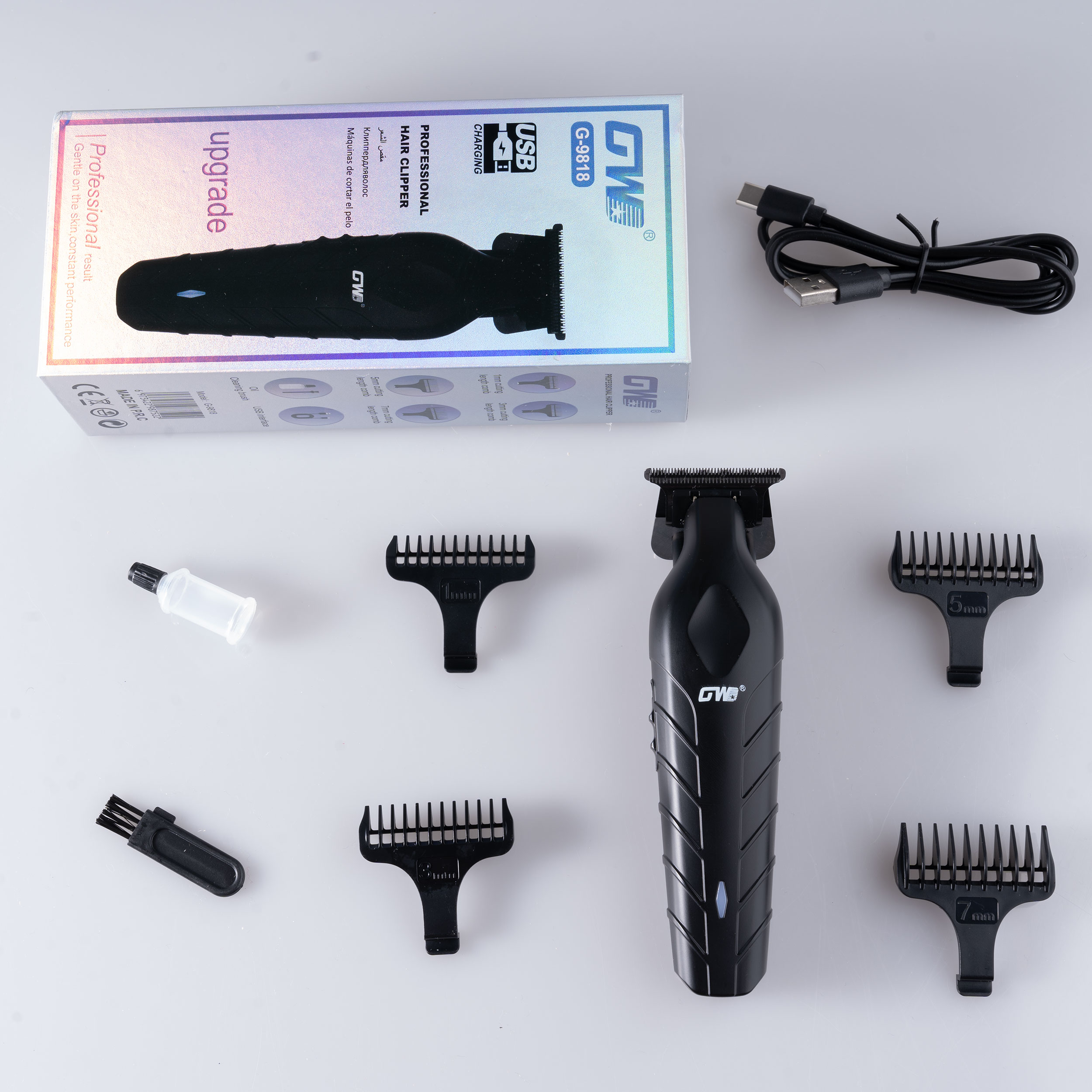 ماشین اصلاح موی سر و صورت جی دبلیو مدل G-9818، اصلاح به صورت صفر زن، خط زن، باقابلیت تنظیم سرعت و طراحی ارگونومیک، تکنولوژی اصلاح به صورت تریم، مدت زمان شارژ 120 دقیقه و مدت زمان استفاده پس از شارژ 100 دقیقه، دارای چراغ نشانگر عملکرد و شارژ و دو حالت سرعت