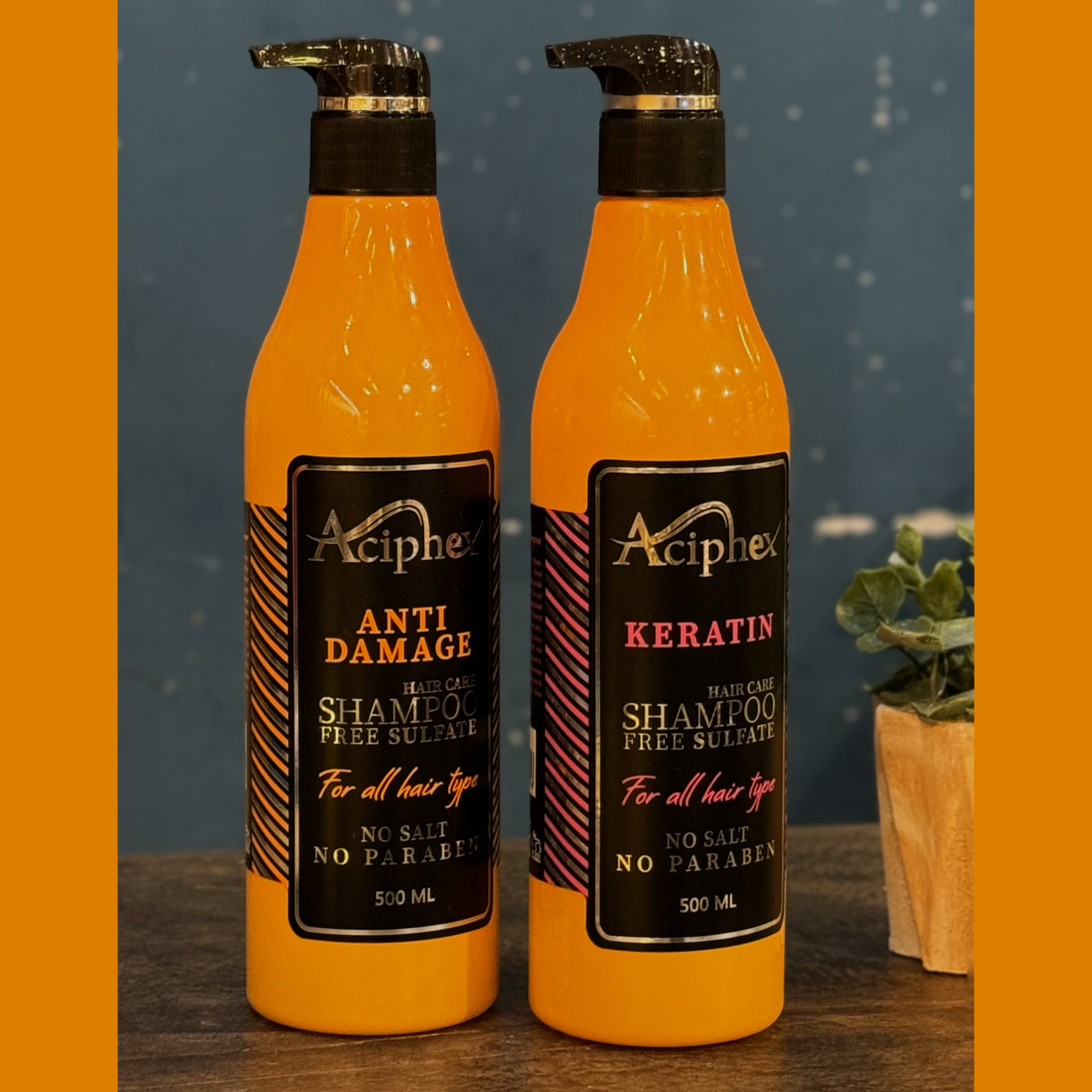 شامپو تقویت کننده و ترمیم کننده مو اسیفکس مدل آرگان-کراتین مناسب برای موهای آسیب دیده حجم 500 میلی لیتر بسته دو عددی