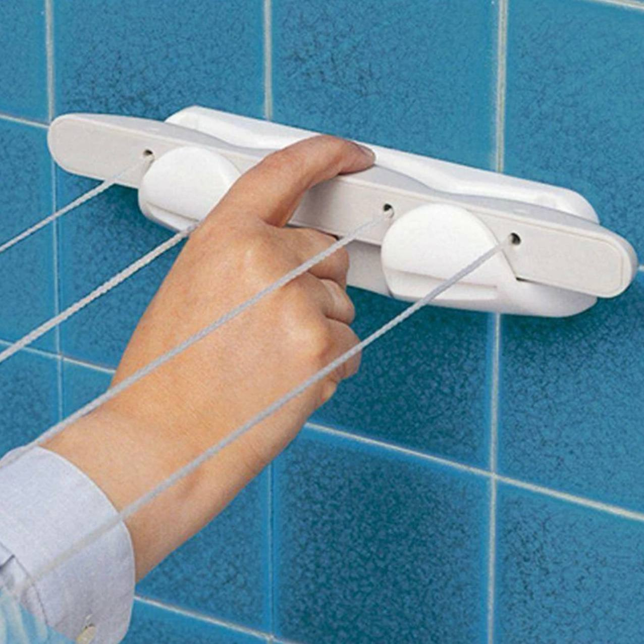 بند رخت دیواری مدل جمع شو