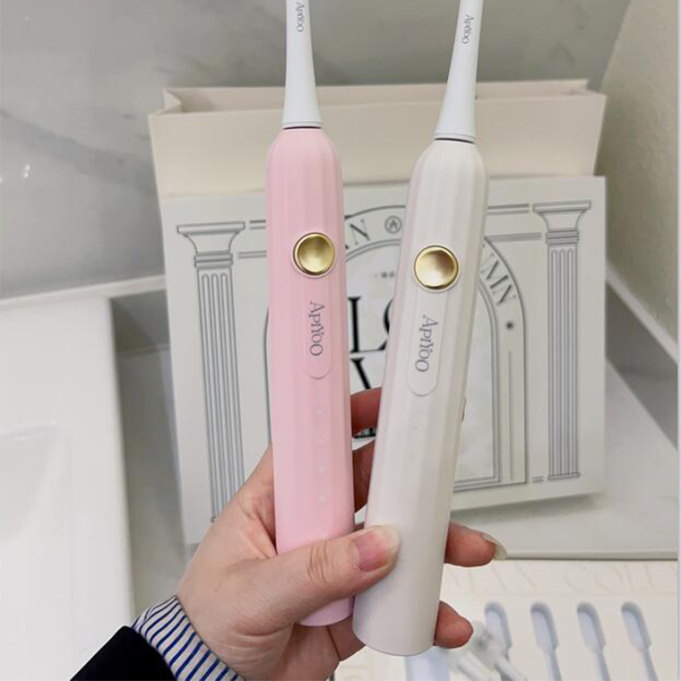 مسواک برقی آپیو مدل T12-A به همراه 4 سری یدک  مجموعه 2 عددی