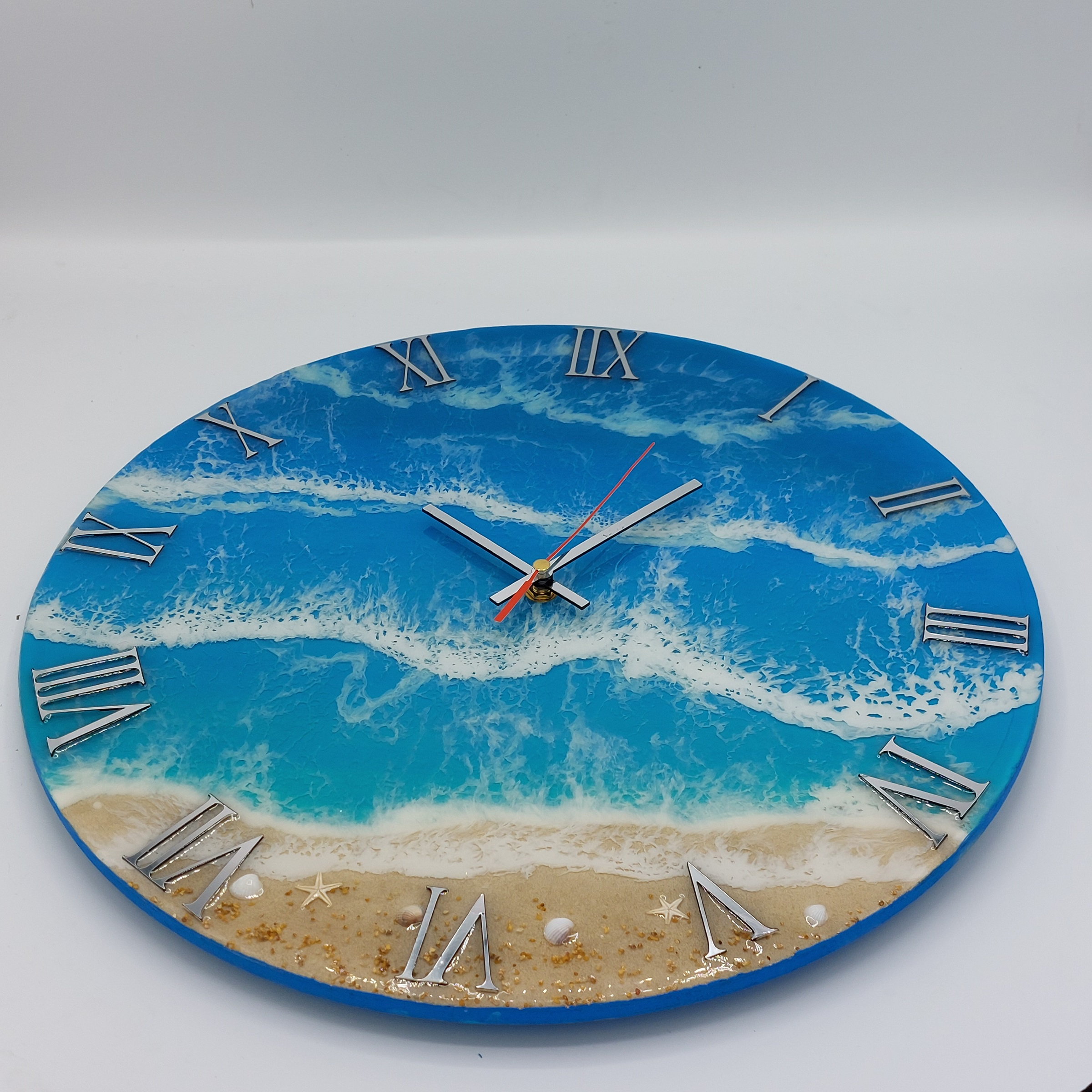 ساعت دیواری رزینی طرح دریا مدل 252