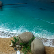 ساعت دیواری رزینی طرح ساحل و دریا