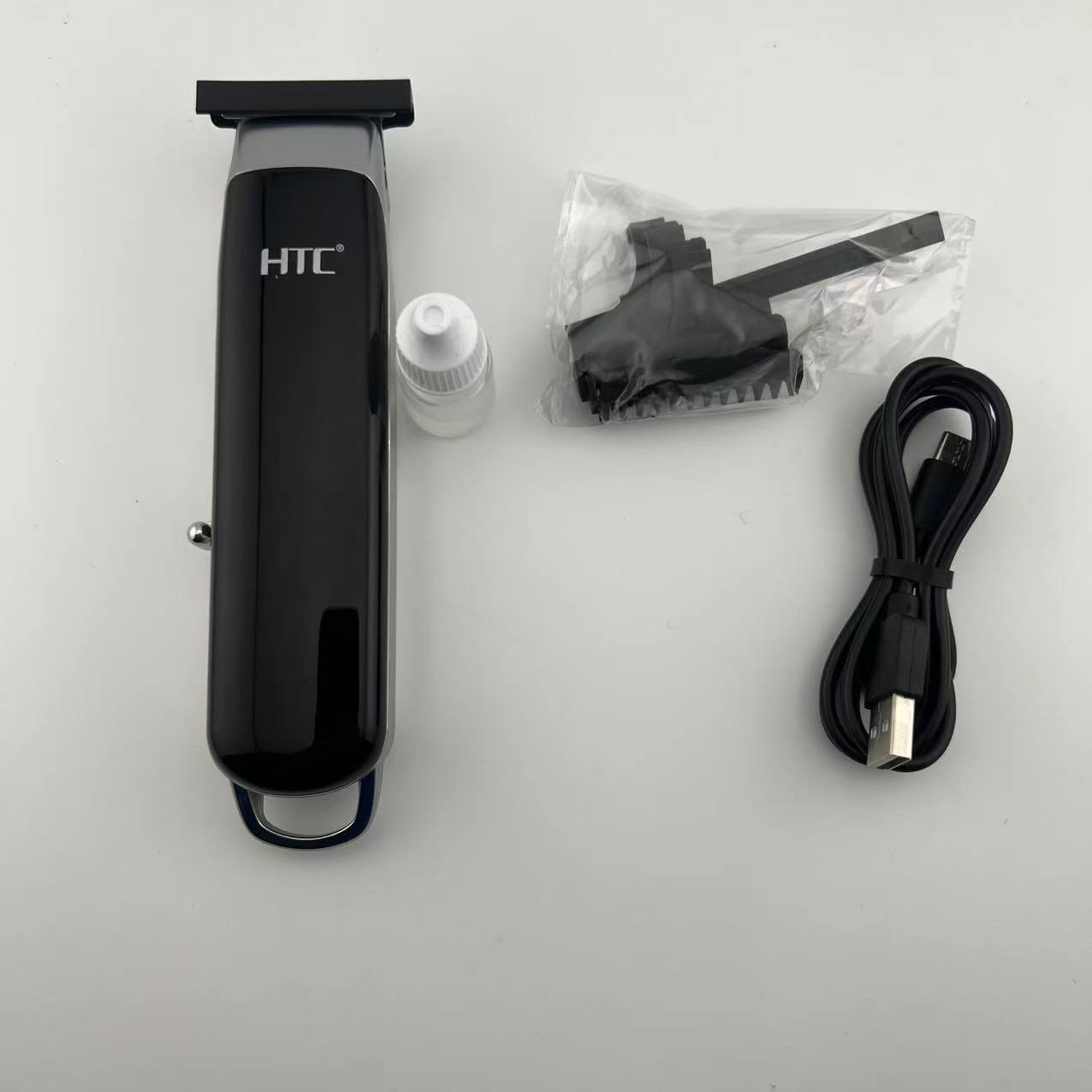 ماشین اصلاح موی سر و صورت شارژی اچ تی سی مدل AT-568