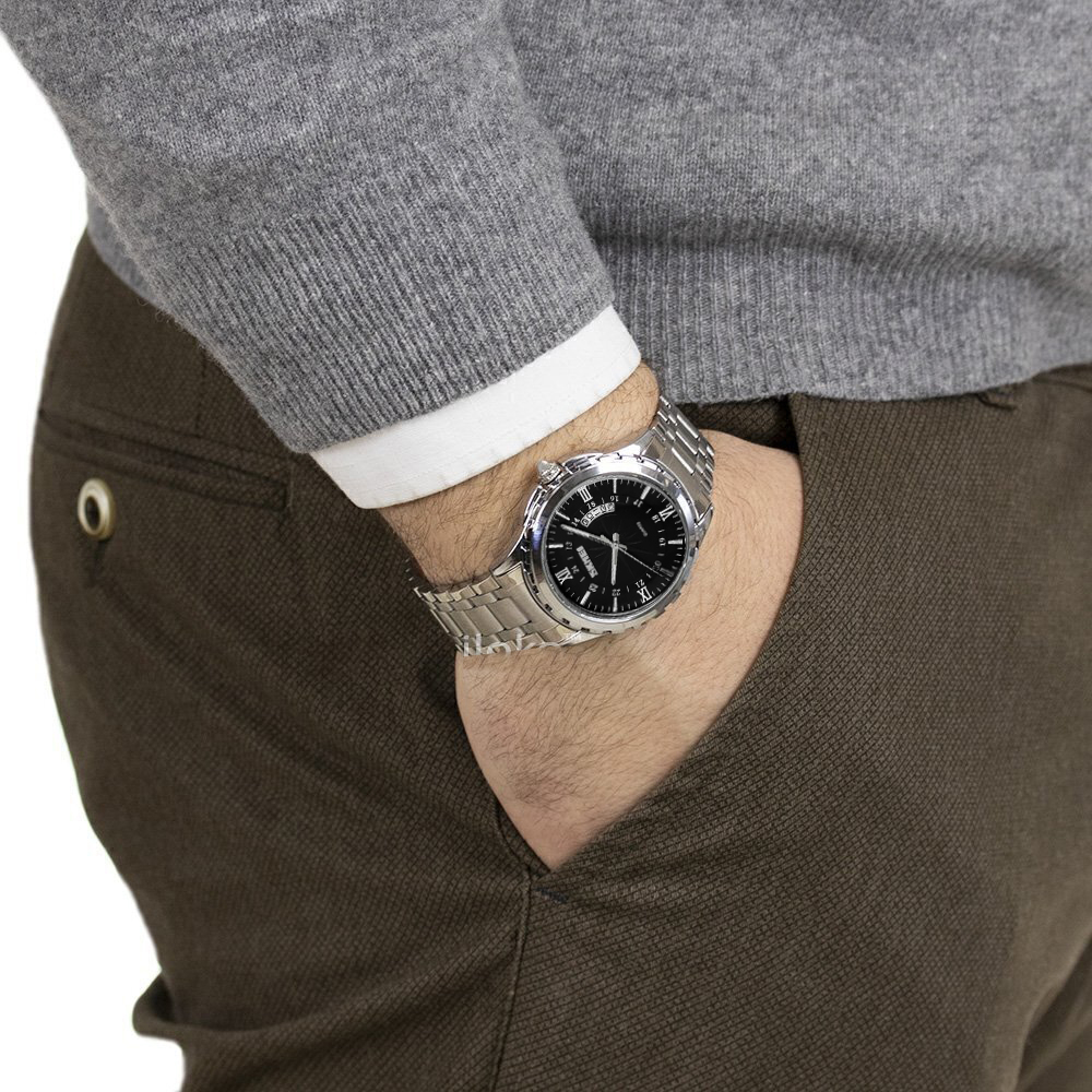 ساعت مچی عقربه‌ای کوارتز مردانه اسکمی مدل 9069BK به همراه دستبند