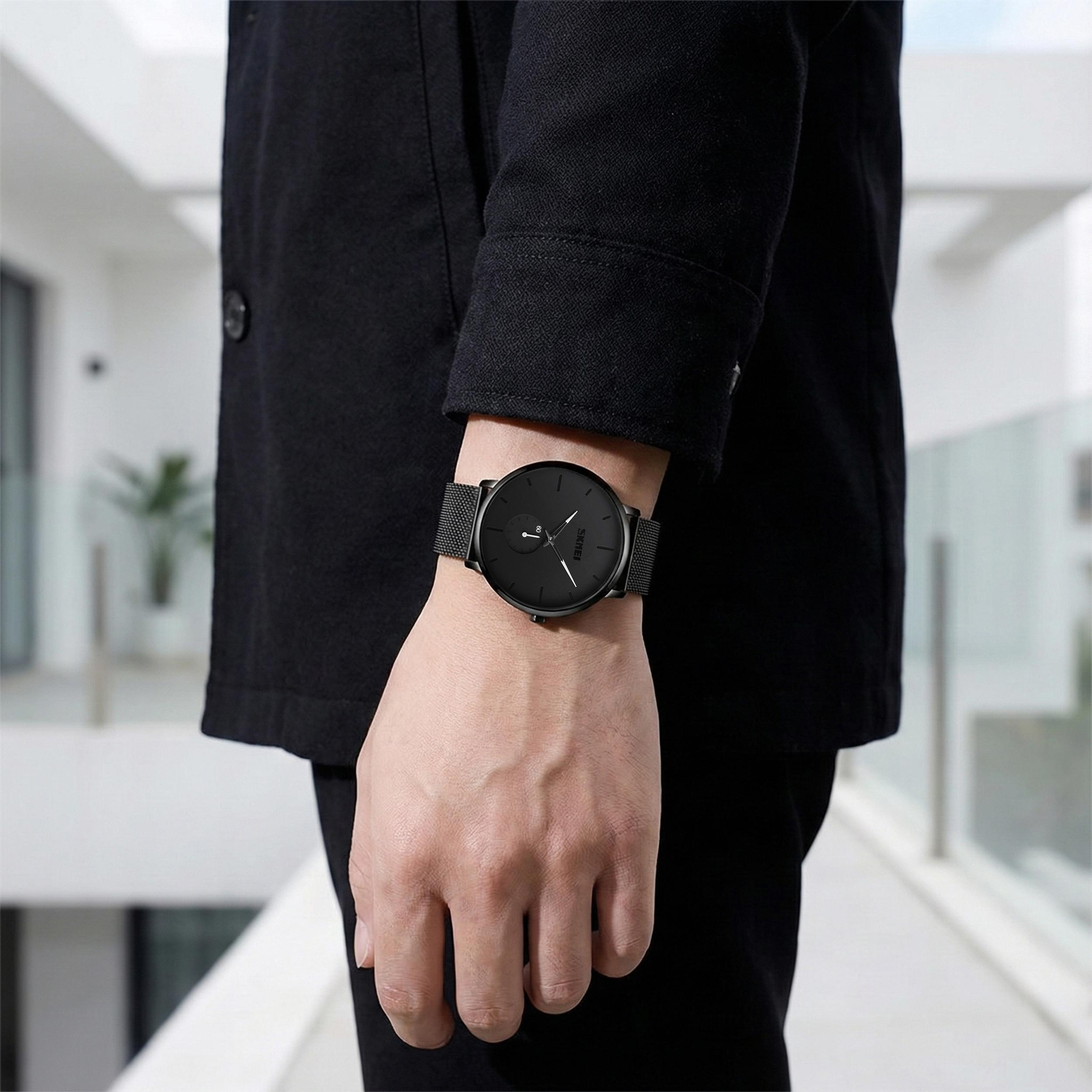 ساعت مچی عقربه ای مردانه اسکمی کد 9185