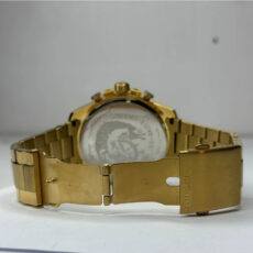 ساعت مچی عقربهای مردانه کوارتز مدل دیزل شاختدار بند طلایی