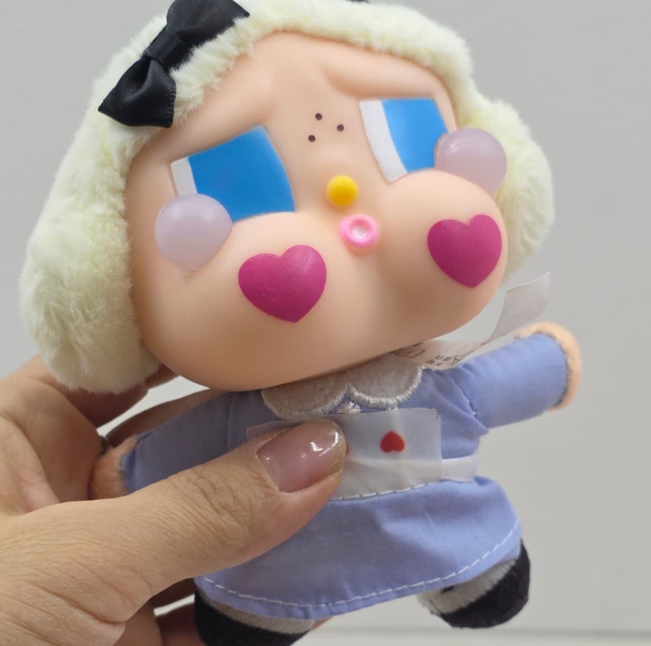 آویز عروسکی ناب سل مدل عروسک ناب سل مدل کرای بیبی ارتفاع 15سانتی متر CRYBABY NAAB005 به همراه جاسوییچی