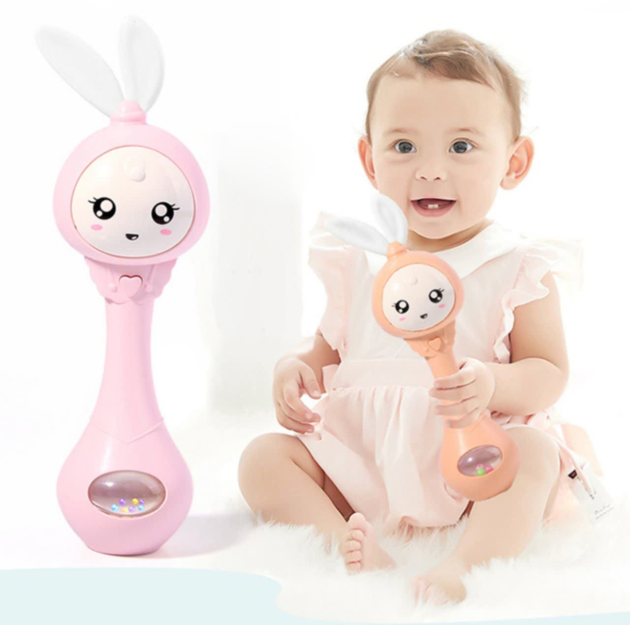 جغجغه ناب سل مدل دستی دندان گیر چراغدار موزیکال خرگوش بامزه  کد Funny rabbit teething hand rattle