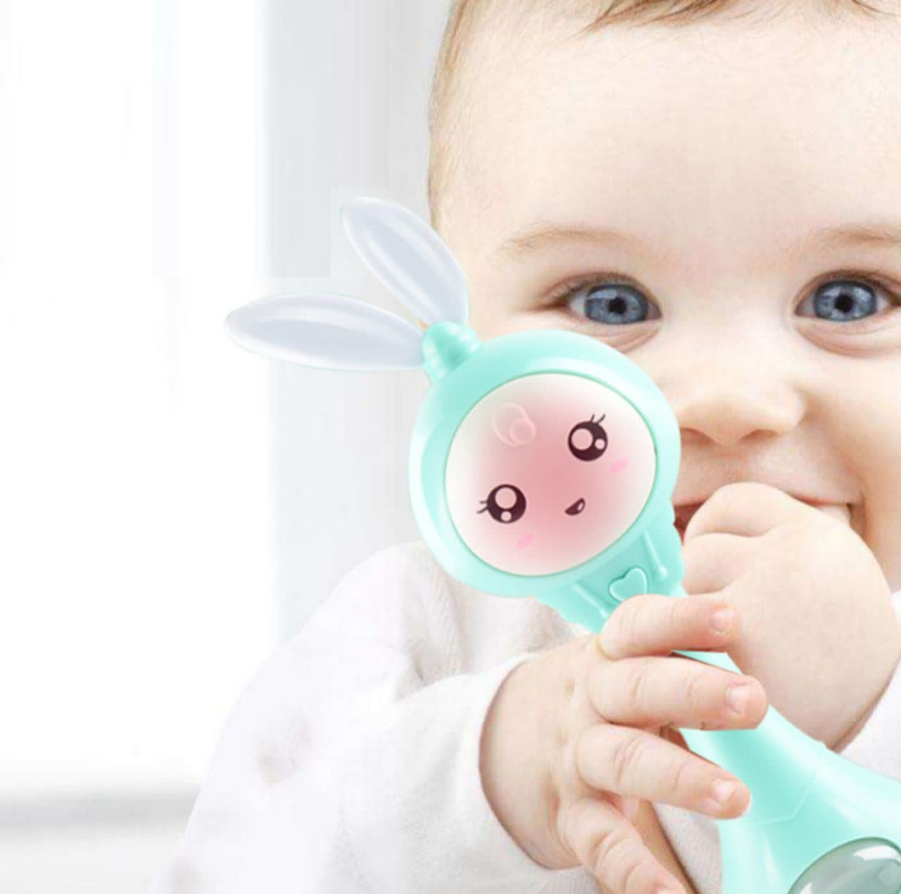 جغجغه ناب سل مدل دستی دندان گیر چراغدار موزیکال خرگوش بامزه  کد Funny rabbit teething hand rattle