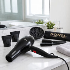 سشوار حرفه‌ای 2600 وات سانیل مدل STP-8803، موتور AC دارای سری متمرکز‌کننده باریک، متمرکز‌کننده پهن با ویژگی صاف‌کنندگی، حجم‌دهندگی، با قابلیت باد سرد